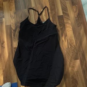 This is a black athletic dress. It has spandex sewed in and is a nice fit.
